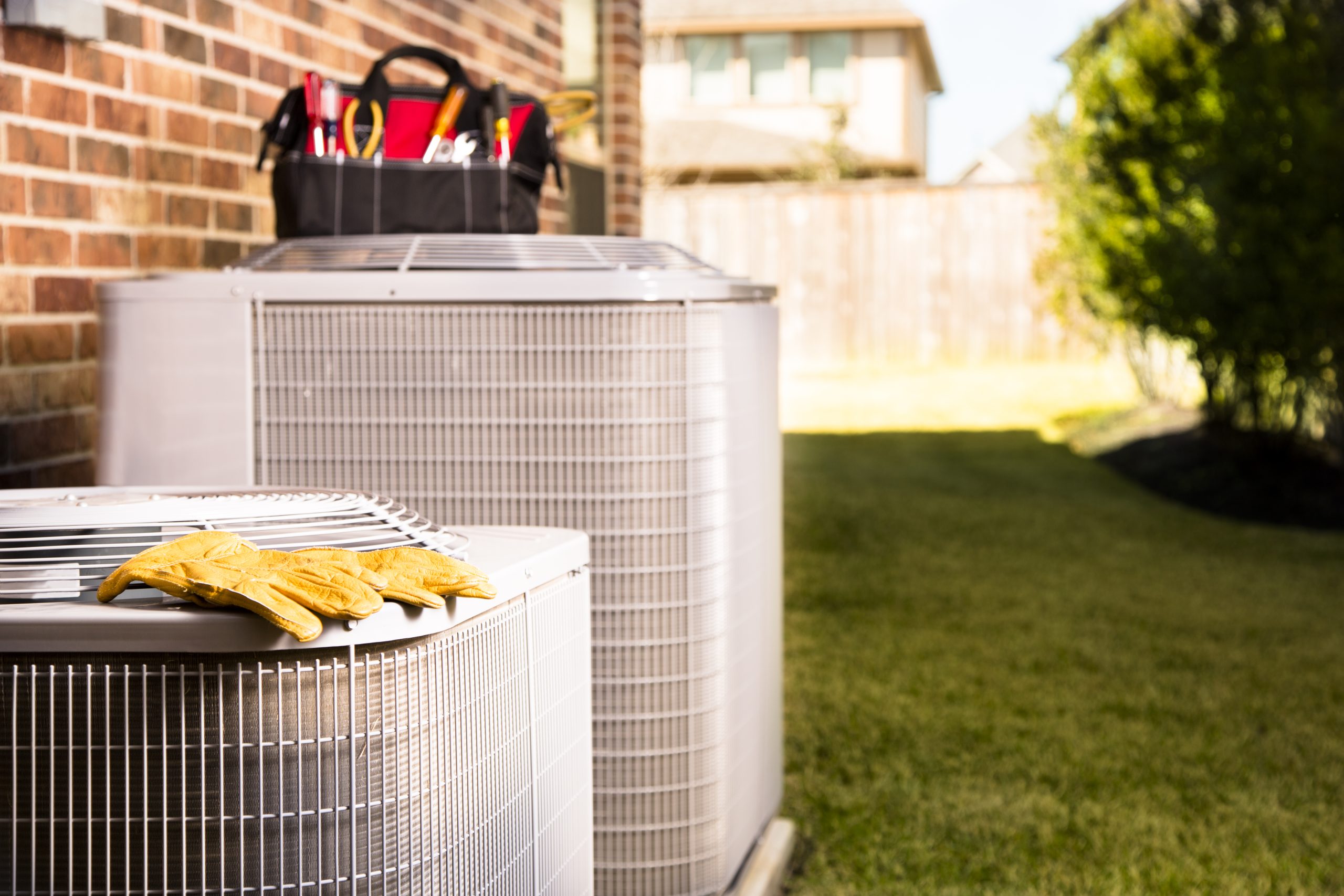 Service Industry:  Work tools on air conditioners. Outside residential home.